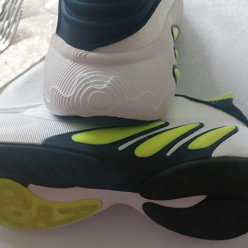 Adidas Adifom SLTN shoes in the Cloud White / SolarYellow / Blue Colorway